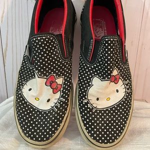 Hello Kitty Vans. Worn but no holes, still in good condition.